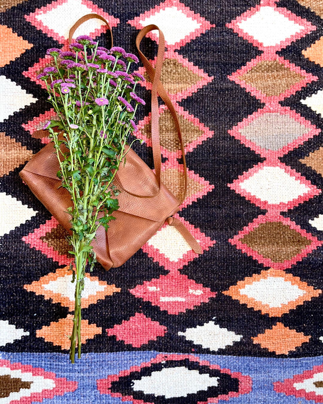 SUEÑO handwoven wool rug from North Argentina. Fair trade and sustainable. Handcrafted from indigenous women artisans. 120x60 cm.